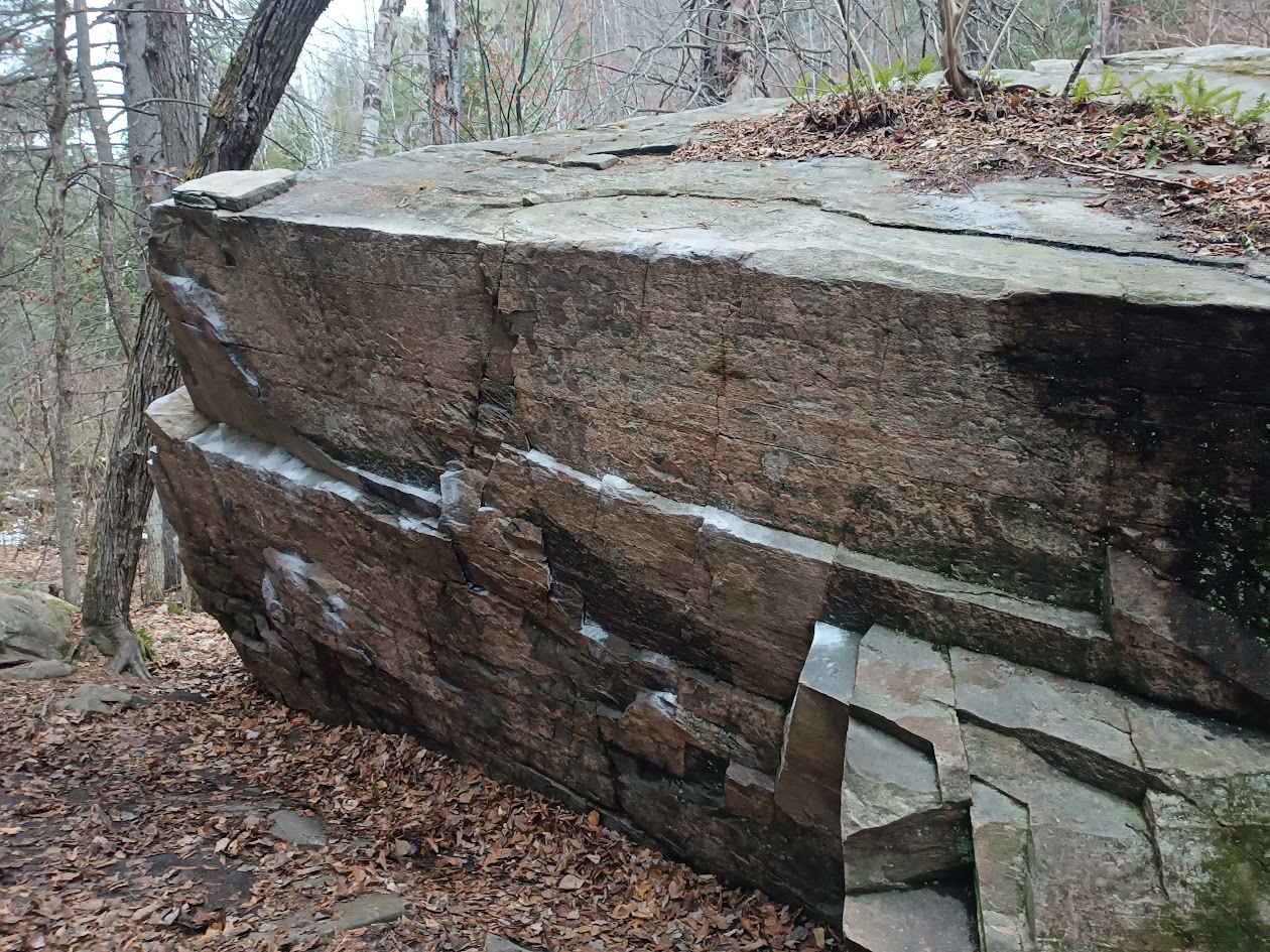 One of the many boulders in the area with chalk marks on it.